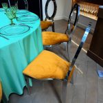 Silver chair with amber cushion