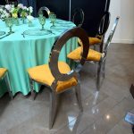 Silver chair with amber cushion