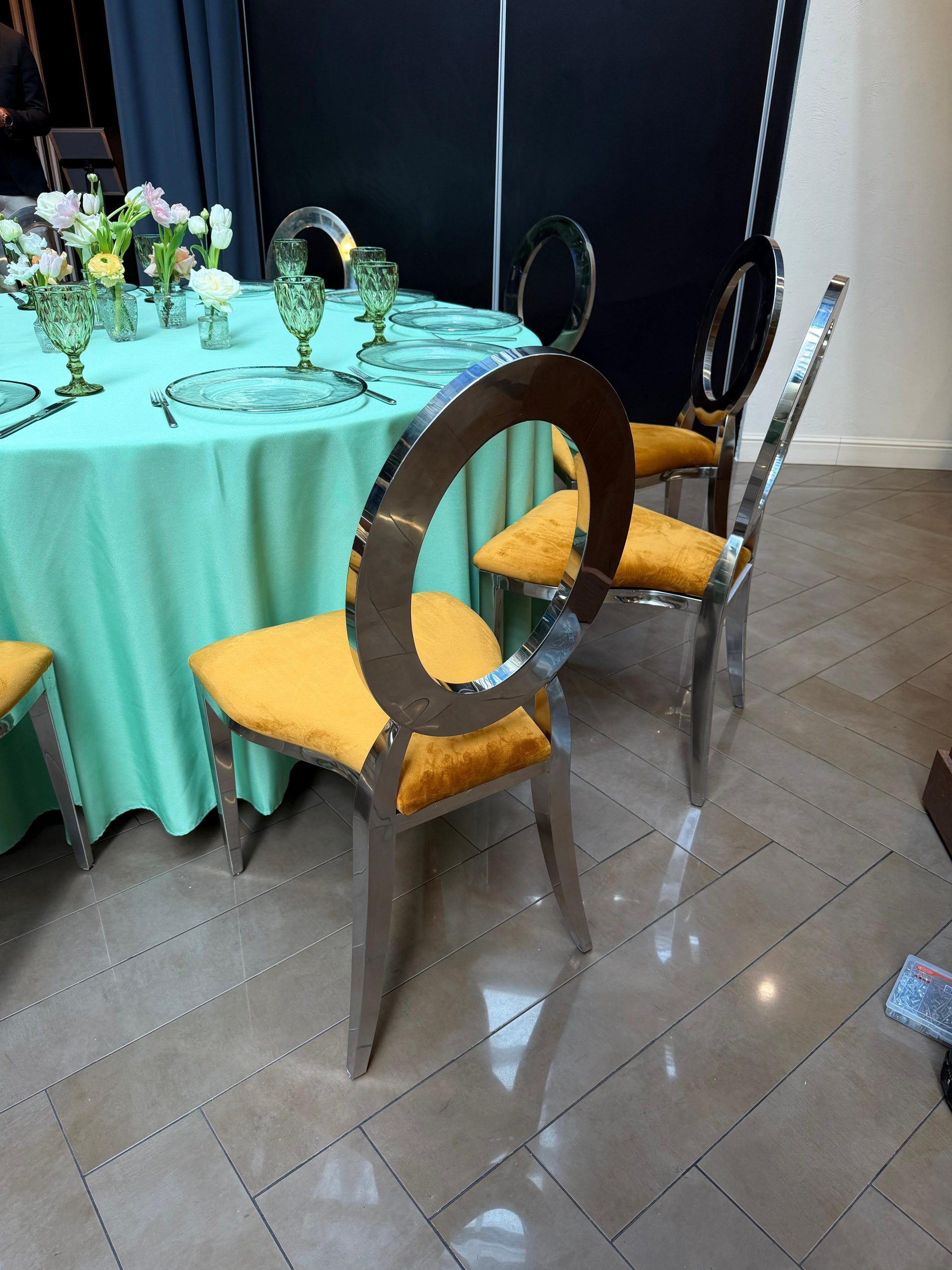 Silver chair with amber cushion