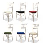 Wooden chair with different pillow colors