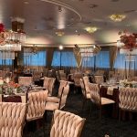 Golden chair with a beige pillow