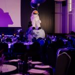 Inflatable astronaut with planet