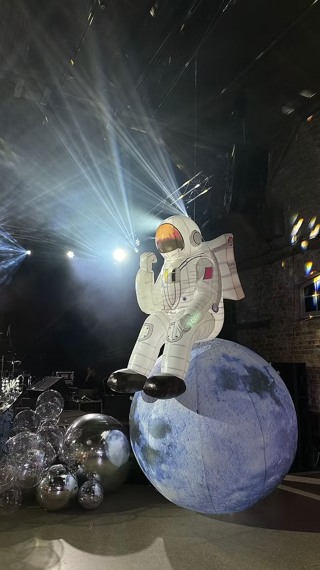 Inflatable astronaut with planet