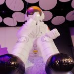 Inflatable astronaut with planet