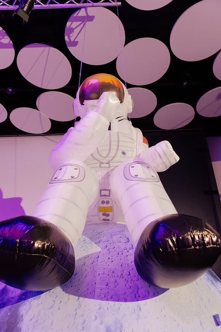 Inflatable astronaut with planet