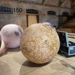 Inflatable ochre yellow planet