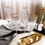 Transparent glasses with gold rim