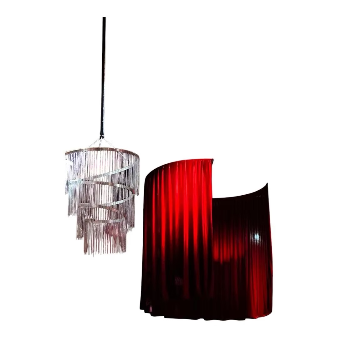 Red velour drapery for chandeliers