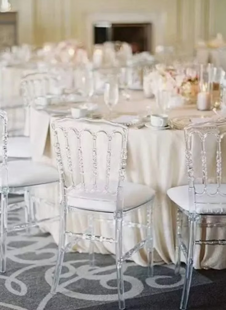 Transparent chair with different pillow colors