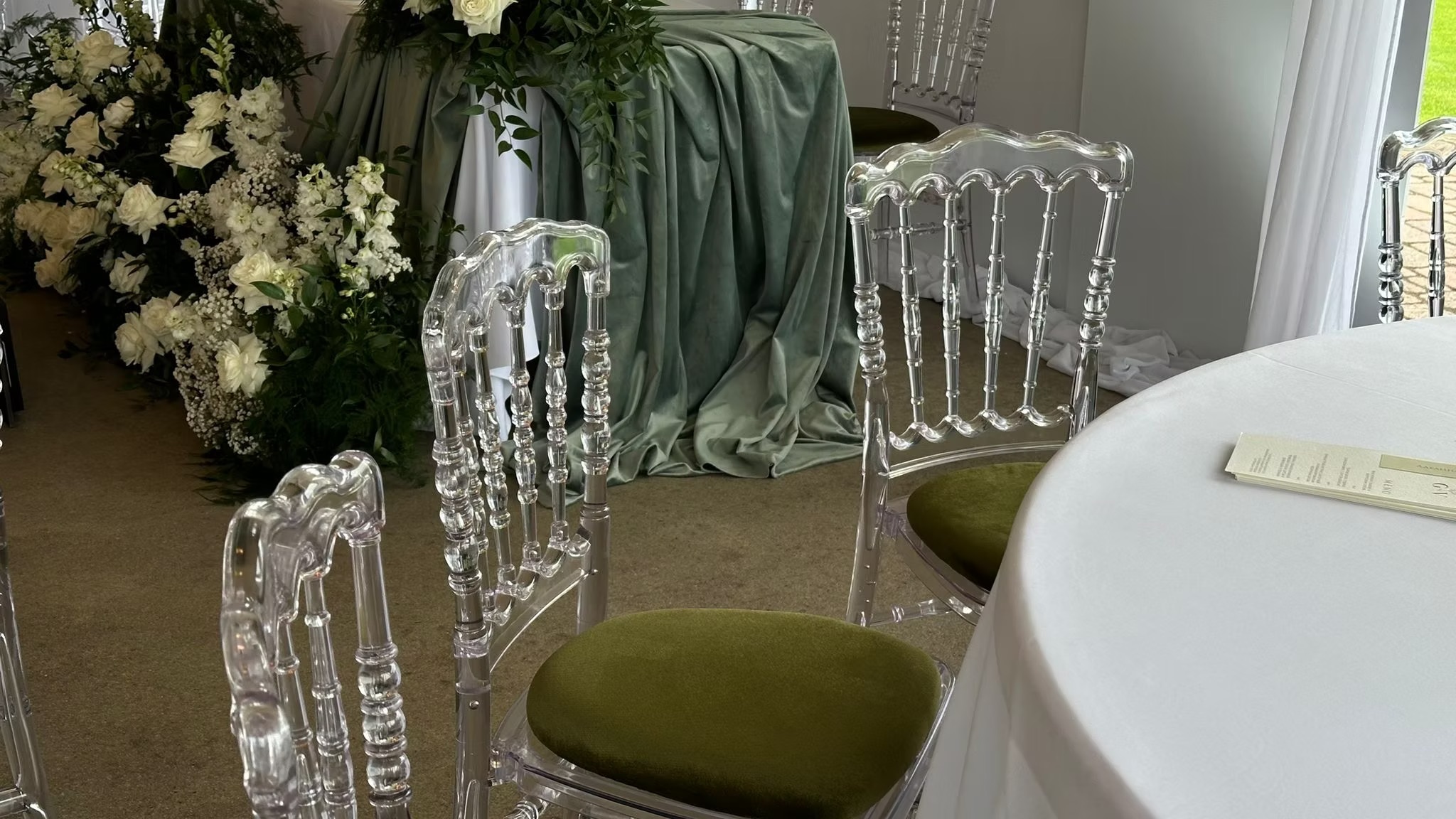 Transparent chair with different pillow colors