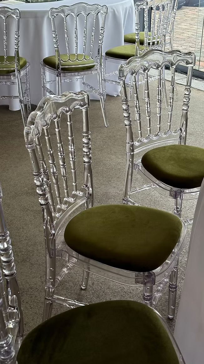 Transparent chair with different pillow colors