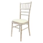 Wooden chair with different pillow colors