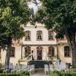 Wooden chair with different pillow colors