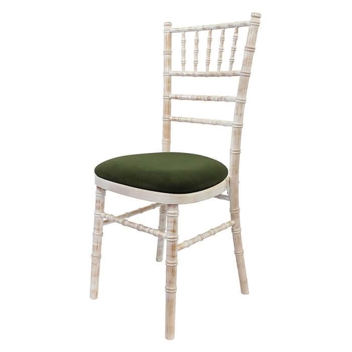 Wooden chair with different pillow colors