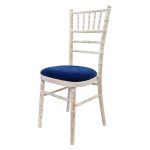 Wooden chair with different pillow colors