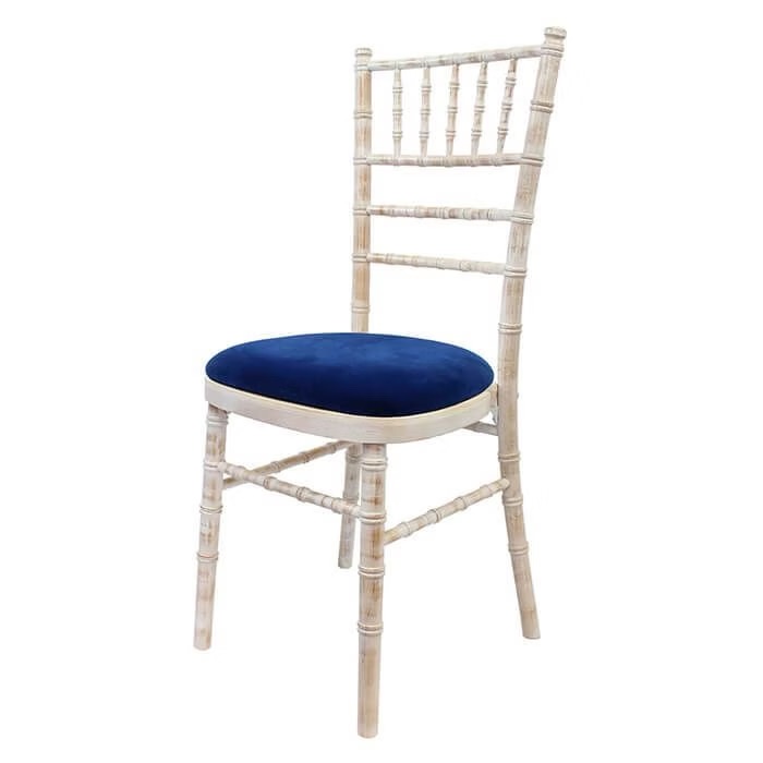 Wooden chair with different pillow colors