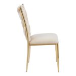 Golden chair with a beige pillow