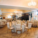 Golden chair with a beige pillow