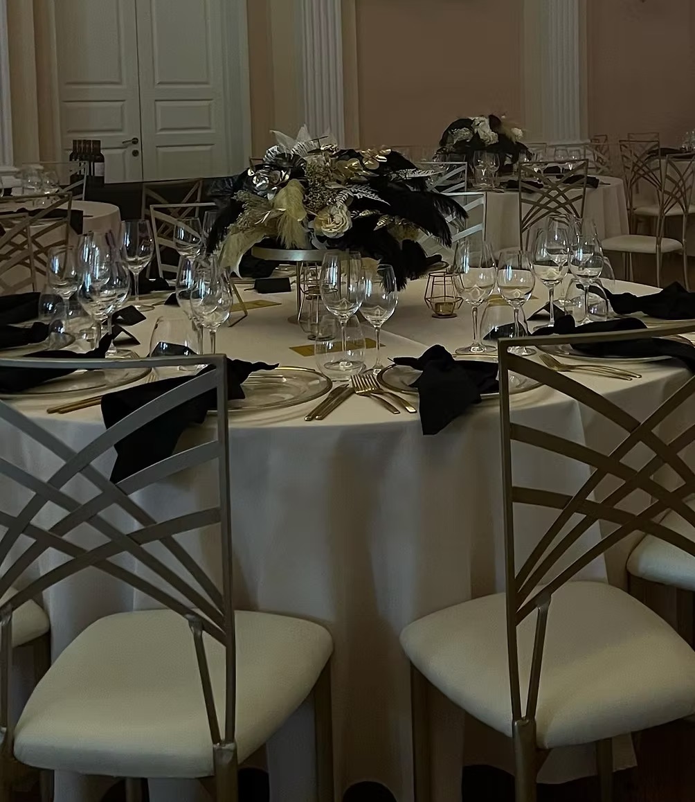 Gold chair with white cushion