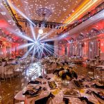 Gold chair with white cushion