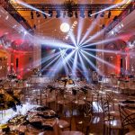 Gold chair with white cushion