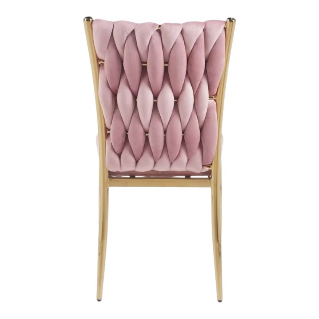 Golden chair with a pink pillow