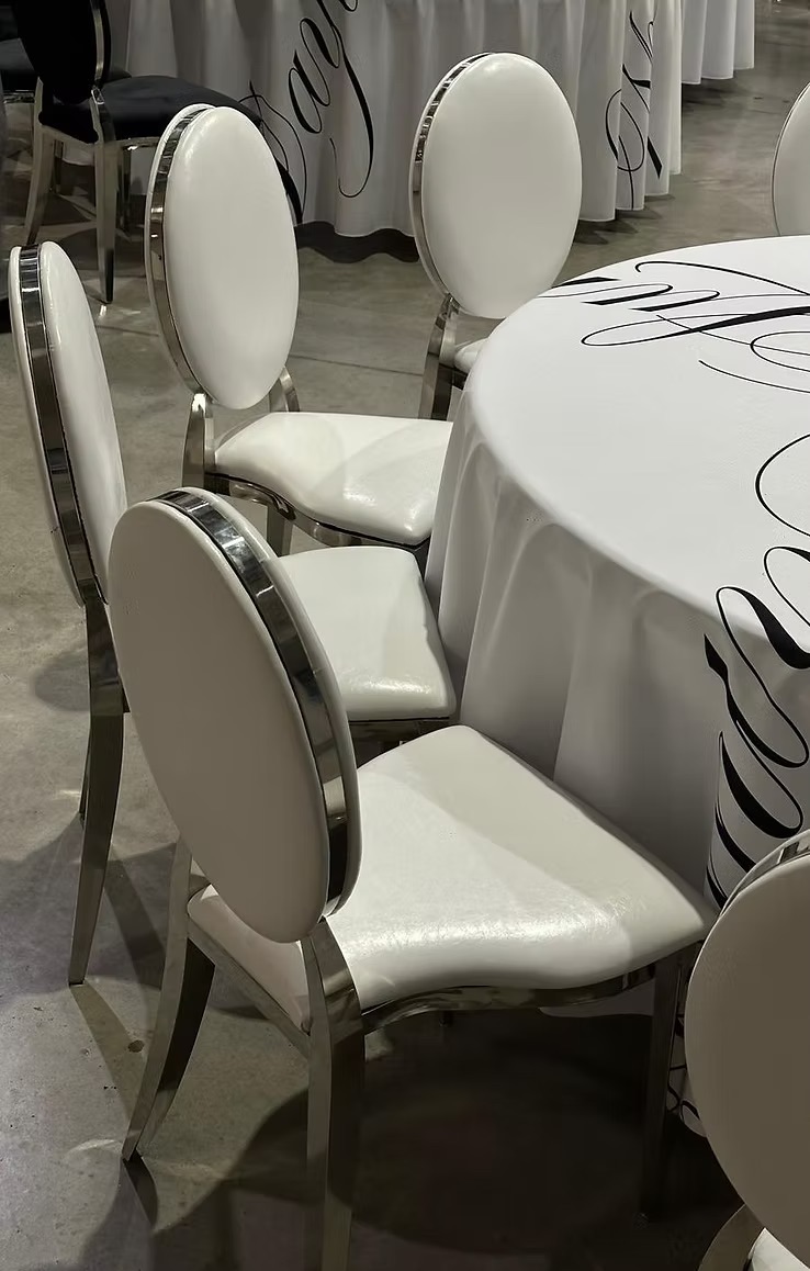 Silver chair with white cushion