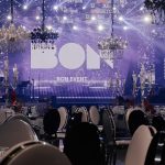 Silver chair with white cushion