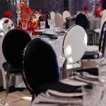 Silver chair with white cushion