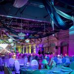 Silver chair with white cushion