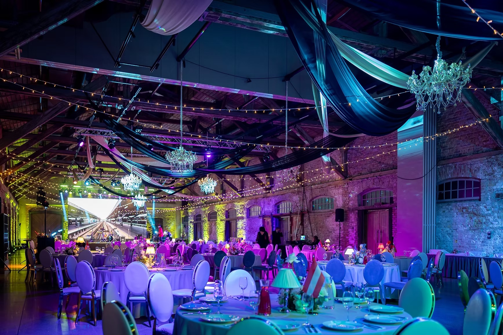 Silver chair with white cushion