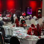 Silver chair with black cushion