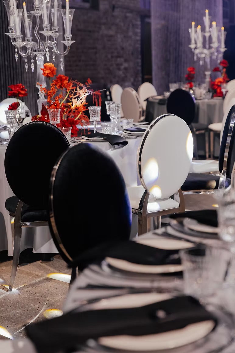 Silver chair with black cushion