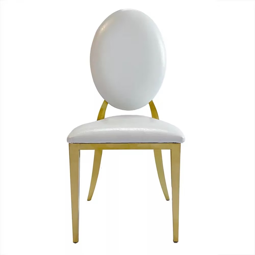 Gold chair with white cushion