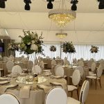 Gold chair with white cushion