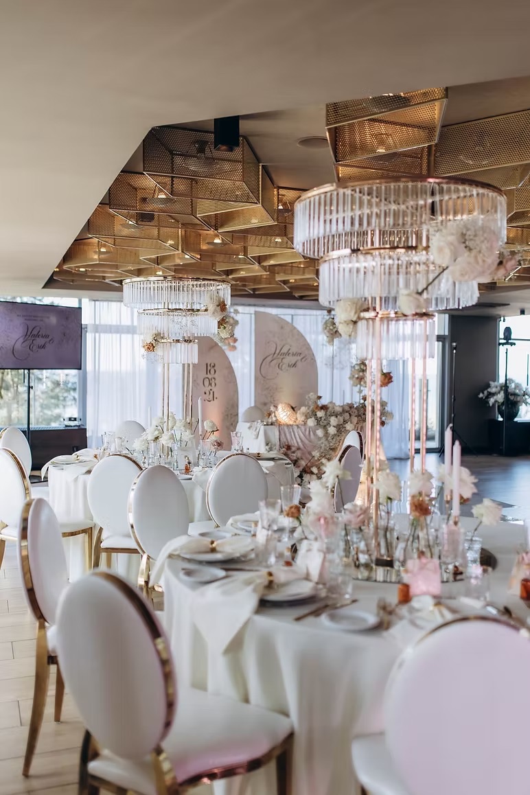 Gold chair with white cushion