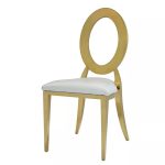 Gold chair with white cushion