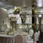 Gold chair with white cushion