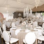 Gold chair with white cushion