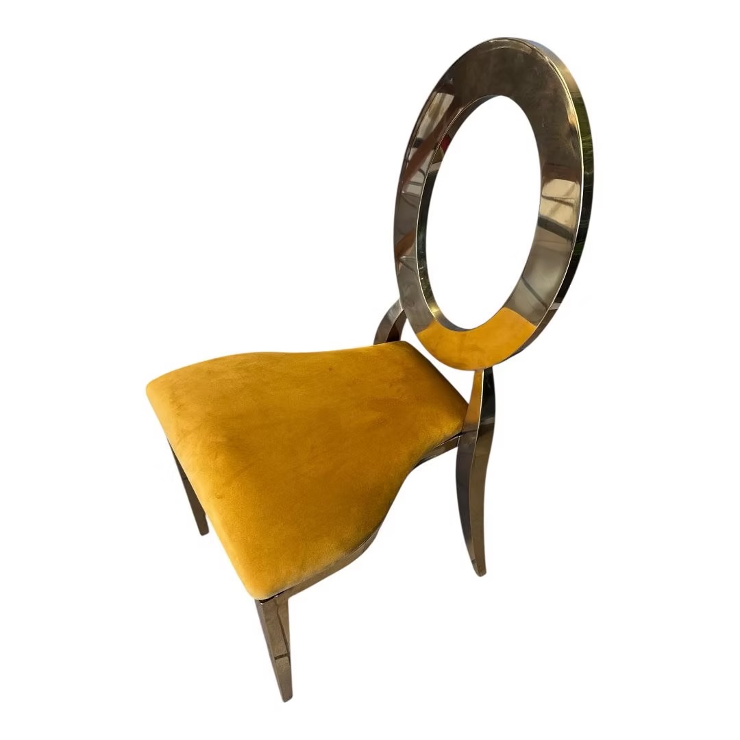 Gold chair with amber cushion