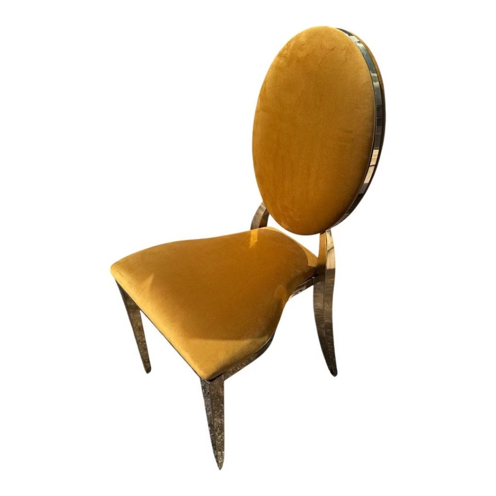 Gold chair with amber cushion
