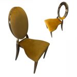 Gold chair with amber cushion
