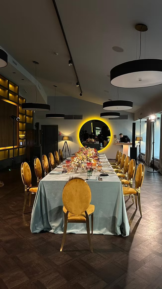 Gold chair with amber cushion