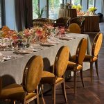 Gold chair with amber cushion