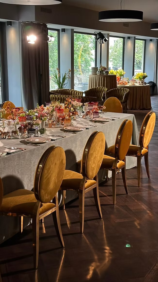 Gold chair with amber cushion