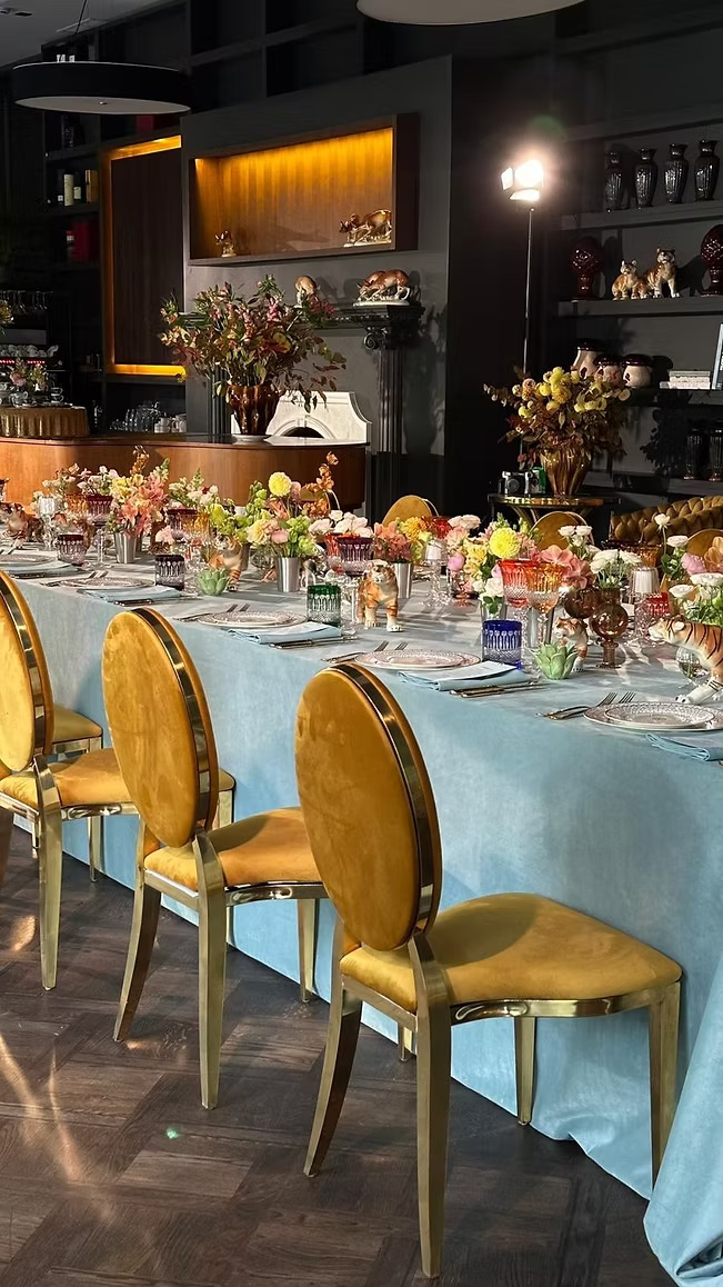 Gold chair with amber cushion