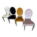 Gold chair with black cushion