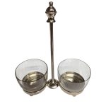 Glass containers with metal holder